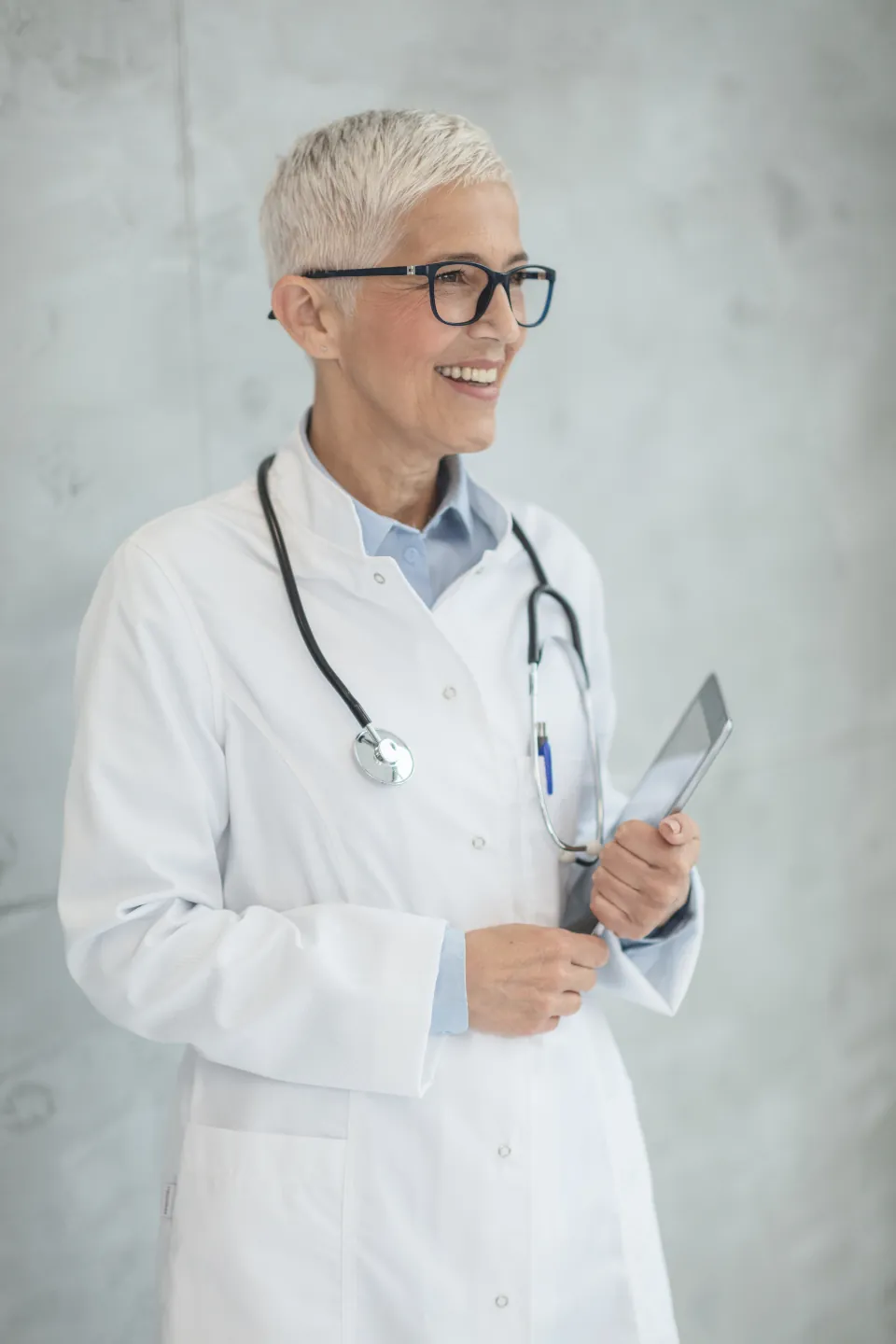 A smiling female doctor with a stethoscope